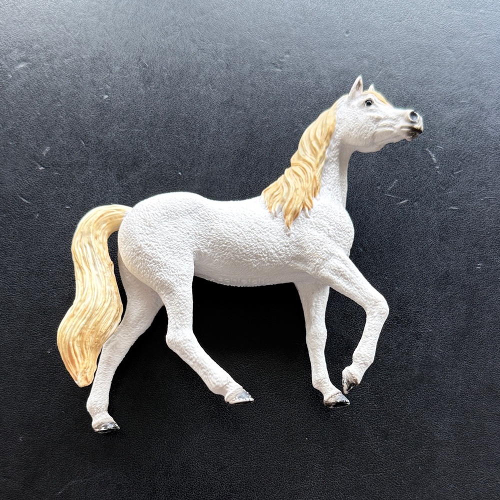 White and Blonde Horse Figurine Decorative Accent” comes with a free saddle”